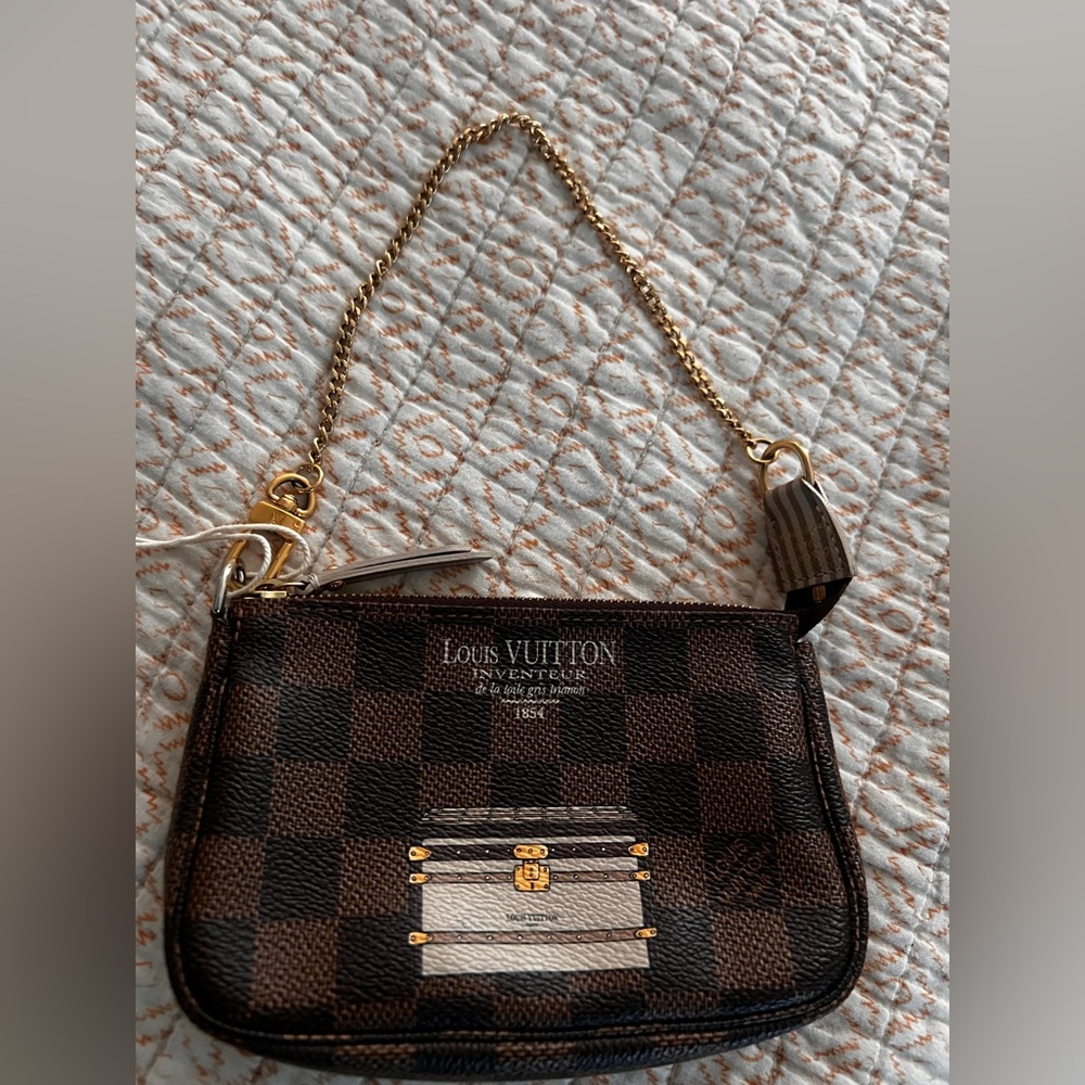AUTHENTIC 🤎 LV  Damier Ebene Mini Pochette with Gold Chain and Trunk Print